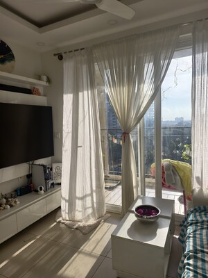 Living Room in 2 BHK Apartment at Bhartiya Nikoo Homes Phase 2, Thanisandra Main Road – for Sale