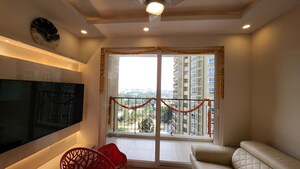 Living Room in 2 BHK Apartment at Bhartiya Nikoo Homes Phase 2, Thanisandra Main Road – for Sale