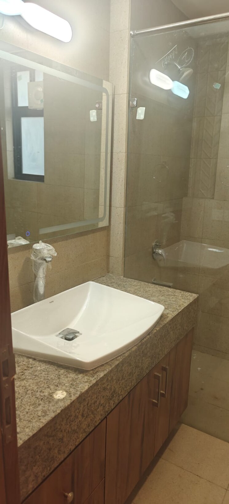 Bathroom, krisumi-waterfall-residences 3 Bedroom 1967 Sq.Ft. Apartment In Sector 36a Gurgaon 9367634