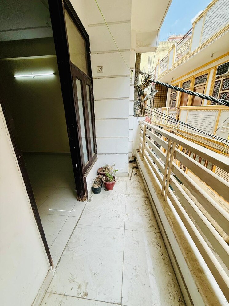 Balcony, rajpur khurd extension 1 RK 250 Sq.Ft. Builder Floor In Rajpur Khurd Extension Delhi 9367729