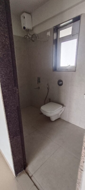 Bathroom in 2 BHK Apartment at Puraniks City Reserva, Ghodbunder Road – for Rent