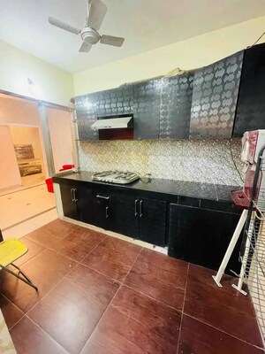 Kitchen in 2 BHK Apartment at Bolinj Mhada CHS, Virar East – for Rent