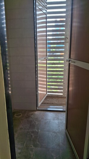 Staircase in 1 BHK Apartment at K K Nehru Tower, Ulwe – for Rent