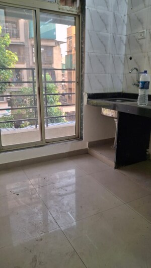 Kitchen in 1 BHK Apartment at K K Nehru Tower, Ulwe – for Rent