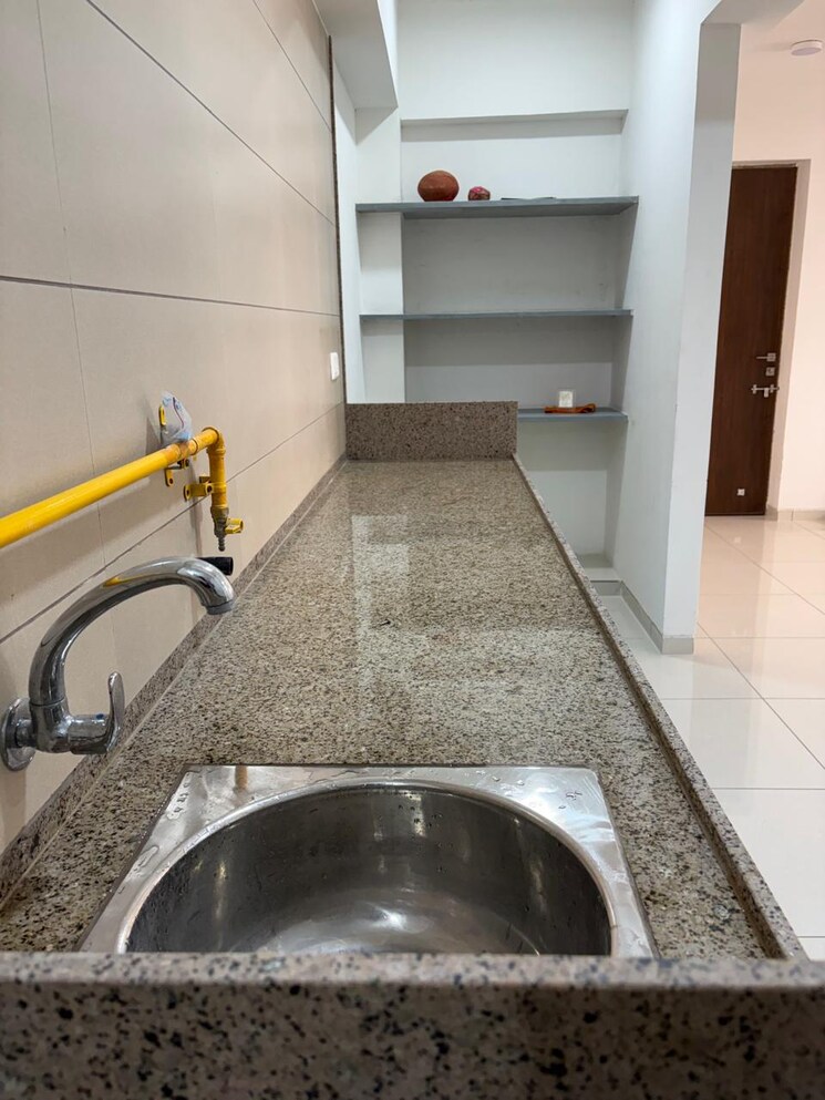 Kitchen, sun-atmosphere 2 Bedroom 712 Sq.Ft. Apartment In Shela Ahmedabad 9367965