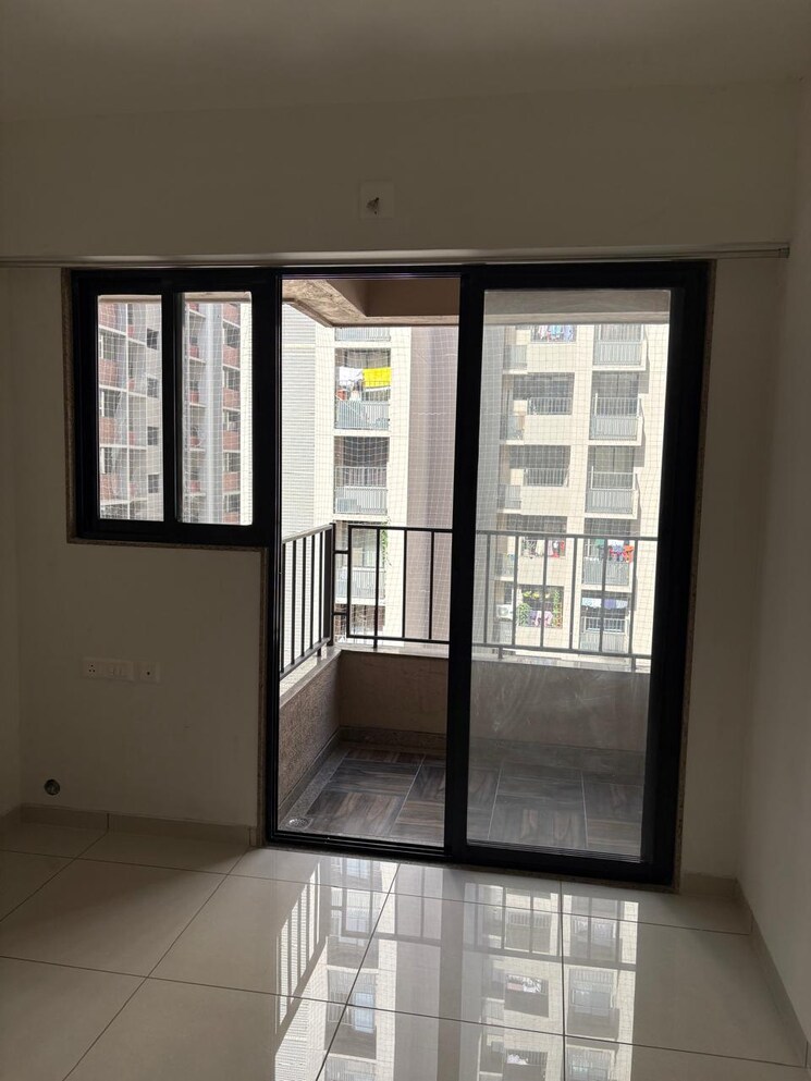 Room, sun-atmosphere 2 Bedroom 712 Sq.Ft. Apartment In Shela Ahmedabad 9367965