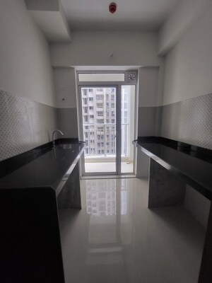 Living Room in 2 BHK Apartment at Lodha Amara, Kolshet Road – for Rent