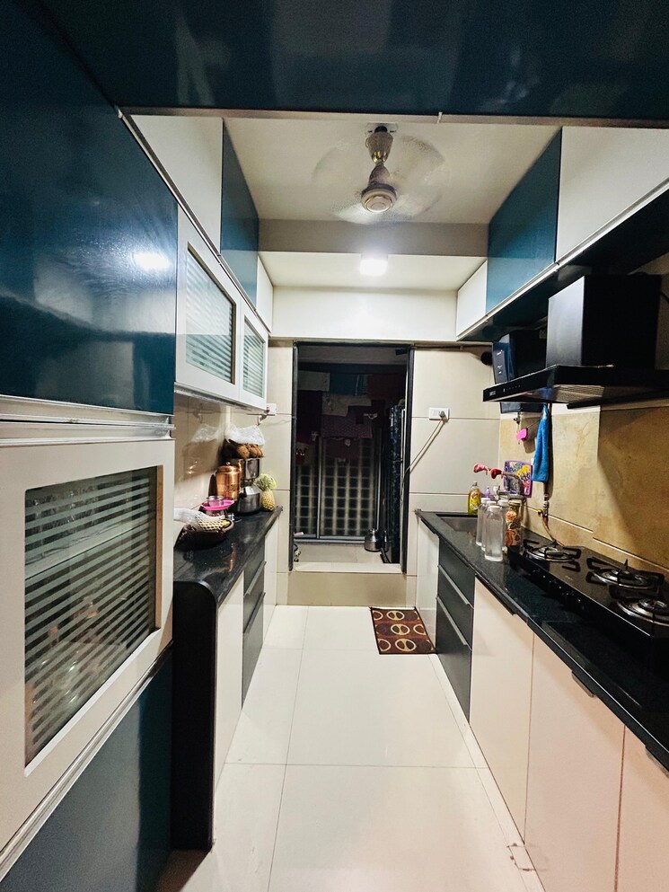 Kitchen, unique-greens-ghodbunder-road 1 Bedroom 450 Sq.Ft. Apartment In Ghodbunder Road Thane 9367990