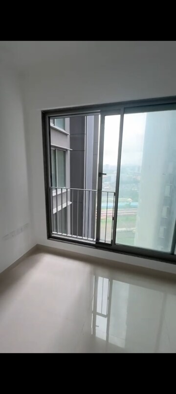 Room in 2 BHK Apartment at Sunteck City Avenue 4, Goregaon West – for Rent