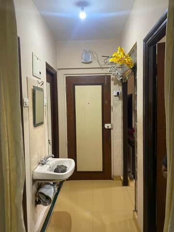 Bathroom in 1 BHK Apartment at Ahuja Sea Crown, Kandivali West – for Rent