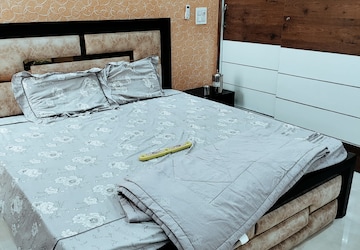 Bedroom in 3 BHK Apartment at Affinity Greens, International Airport Road – for Rent