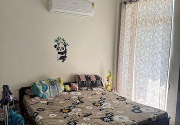 Bedroom in 3 BHK Apartment at Affinity Greens, International Airport Road – for Rent