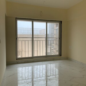 Room in 2 BHK Apartment at Kosmos Kedar Darshan, Kastur Park – for Sale