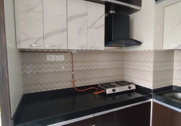 Kitchen in 1 BHK Apartment at Maitreya Park CHS, Daulat Nagar – for Sale