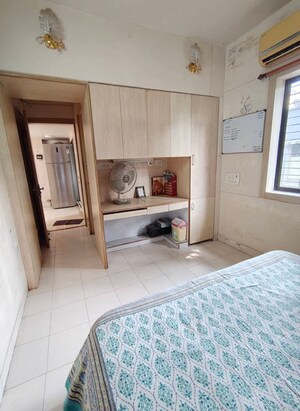 Bedroom in 1.5 BHK Apartment at Sri Gurunanak CHS, Kopri – for Sale