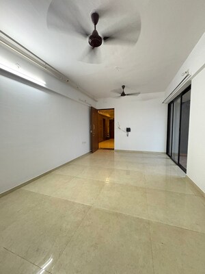 Living Room in 2 BHK Apartment at Lodha Palava City Lakeshore Greens, Dombivli East – for Sale