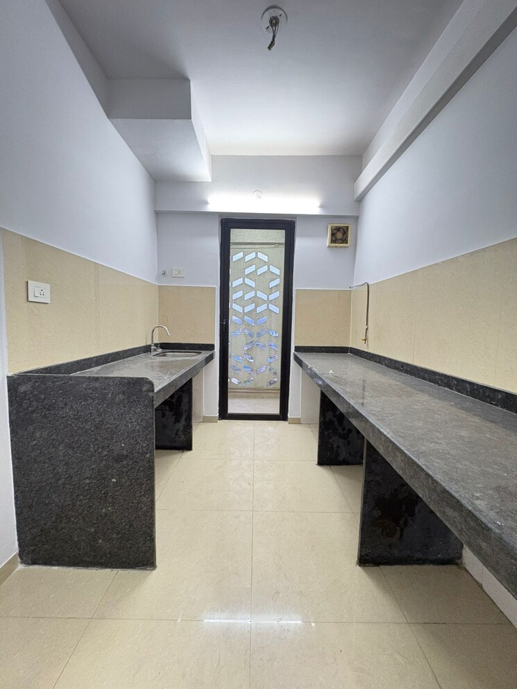 Kitchen, lodha-palava-city-lakeshore-greens 2 Bedroom 734 Sq.Ft. Apartment In Dombivli East Thane 9368299