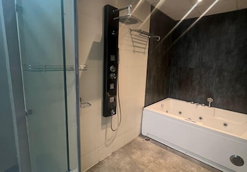 Bathroom in 4 BHK Apartment at Ansal API Esencia, Sector 67 – for Sale