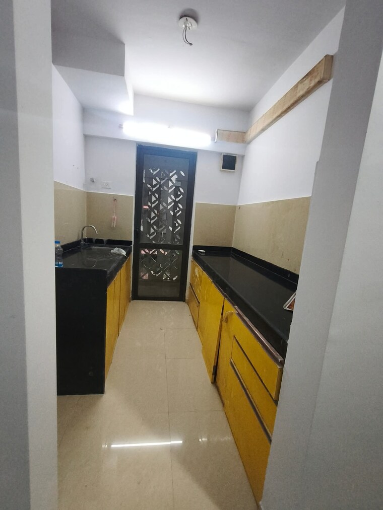 Kitchen, lodha-palava-city-lakeshore-greens 2 Bedroom 730 Sq.Ft. Apartment In Dombivli East Thane 9368347