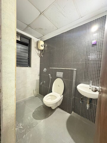 Bathroom in 2 BHK Apartment at Lodha Palava City Lakeshore Greens, Dombivli East – for Rent