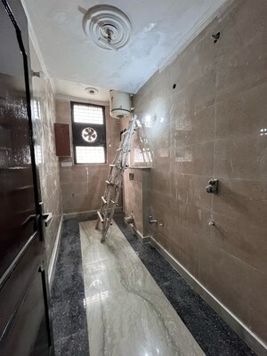 Bathroom in 1.5 BHK Builder Floor at Ansal Sushant Lok I, Sector 43 – for Rent