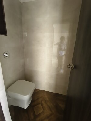 Bathroom in 1 BHK Apartment at Shree Tirupati STG Signature Residency, Patlipada – for Rent