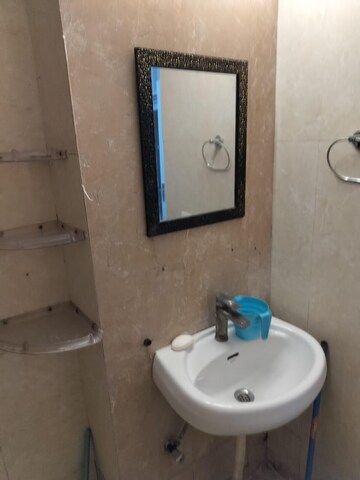 Bathroom in 2 BHK Apartment at Amrapali Princely Estate, Sector 76 – for Rent