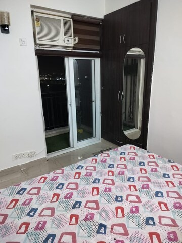 Bedroom in 2 BHK Apartment at Amrapali Princely Estate, Sector 76 – for Rent