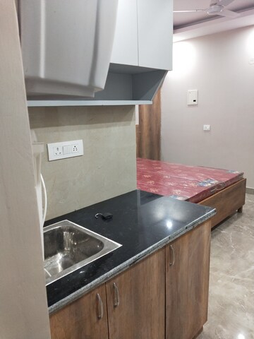 Kitchen in 1 RK Apartment at Dhoot Time Residency, Sector 63 – for Rent