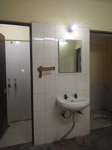 Bathroom in 1 BHK Apartment at Jasola Vihar – for Sale