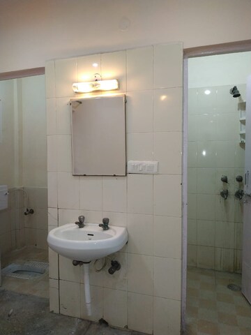 Bathroom in 1 BHK Apartment at Jasola Vihar – for Sale