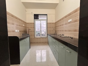 Kitchen in 1.5 BHK Apartment at Sheth Avante, Kanjurmarg West – for Rent