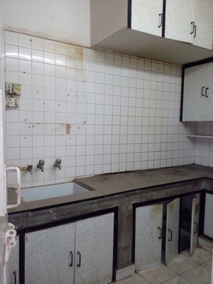Kitchen in 2 BHK Apartment at RWA Jasola Sector 8 SFS Flat, Jasola – for Sale