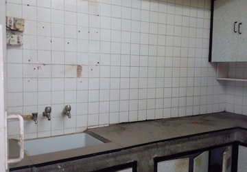 Kitchen in 2 BHK Apartment at RWA Jasola Sector 8 SFS Flat, Jasola – for Sale