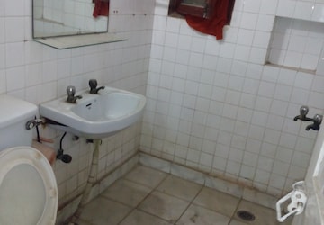 Bathroom in 2 BHK Apartment at RWA Jasola Sector 8 SFS Flat, Jasola – for Sale