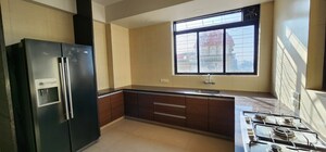 Kitchen in 5 BHK Penthouse at Bhumiraj Iraisaa, Palm Beach – for Rent