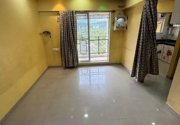 Living Room in 1 BHK Apartment at Rosa Elite, Bhayandarpada – for Rent