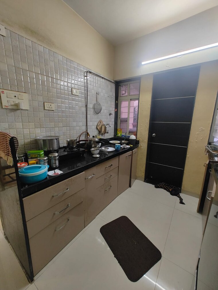Kitchen, prime-space-utsav-homes 1 Bedroom 750 Sq.Ft. Apartment In Bavdhan Pune 9368746