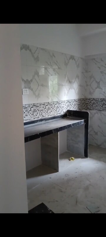 Kitchen in 2 BHK Apartment at DGS Sheetal Tapovan, Malad East – for Rent