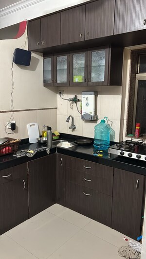 Kitchen in 2 BHK Apartment at Maharaja Retreat CHS, Goregaon East – for Rent