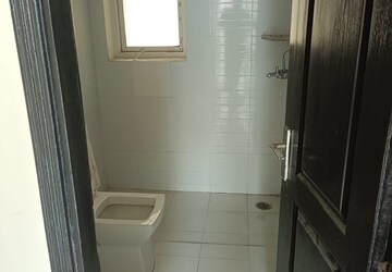 Bathroom in 2 BHK Apartment at Aims Golf Avenue II, Sector 75 – for Rent