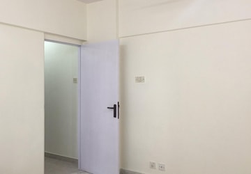 Room in 2 BHK Apartment at Royal Classic Co Op Society, Andheri West – for Sale