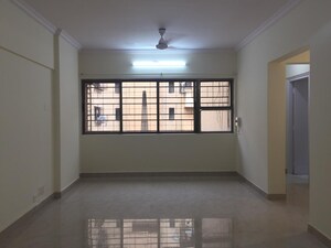 Bedroom in 2 BHK Apartment at Royal Classic Co Op Society, Andheri West – for Sale