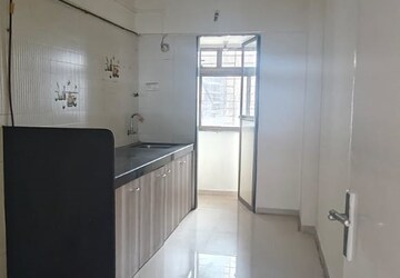 Kitchen in 3 BHK Apartment at Sufalam Apartment Chembur, Chembur – for Rent