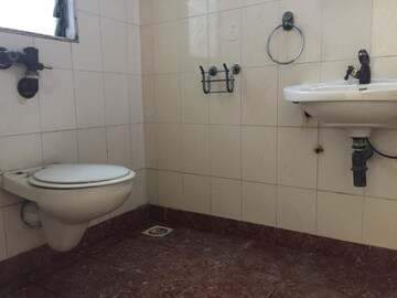 Bathroom in 2 BHK Apartment at Royal Classic Co Op Society, Andheri West – for Rent