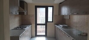 Kitchen in 3.5 BHK Villa at Raheja Vedaanta, Sector 108 – for Rent