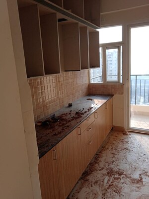 Kitchen in 3 BHK Apartment at Amrapali Crystal Homes, Sector 76 – for Rent
