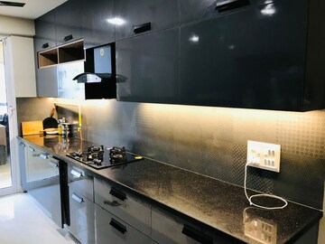 Kitchen in 4 BHK Apartment at Mahagun Mirabella, Sector 79 – for Rent