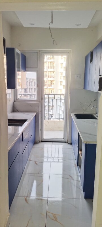 Kitchen in 3 BHK Apartment at Mapsko Paradise, Sector 83 – for Sale