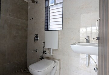 Bathroom in 1 BHK Apartment at Dharti Pressidio, Kandivali West – for Sale